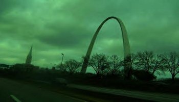 St. Louis Gateway Arch against a green sky St. Louis Gateway Arch against a green sky